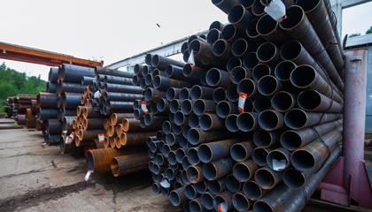 Stacks of steel pipe in a yard
